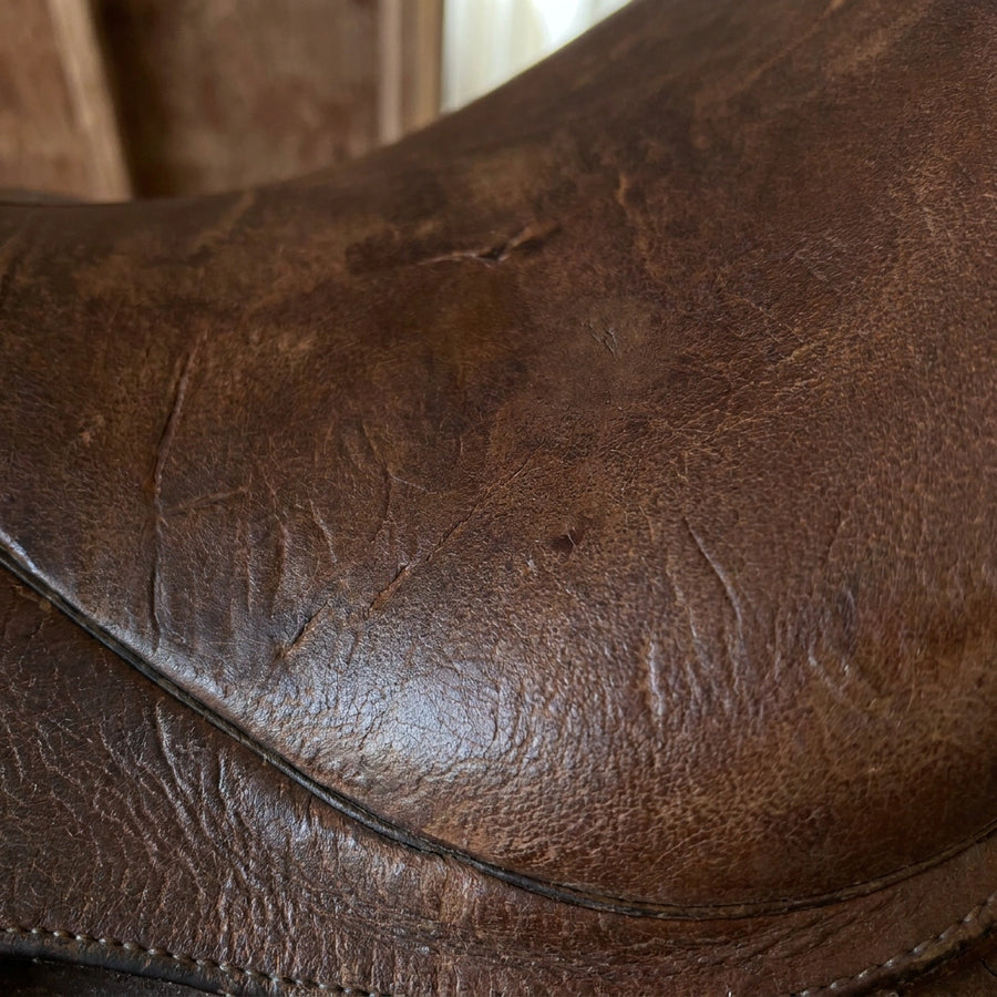 The same leather item after application and buffing