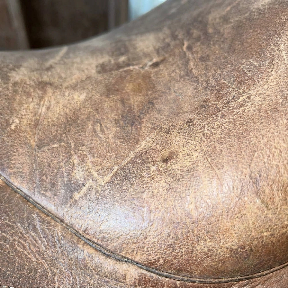 Leather item before Oak and Amber care